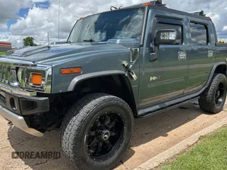 2005 Hummer H2 SUT z VIN 5GRGN22UX5H107012, wystawiony jako Copart lot #56375055 z przebiegiem 149 403 mil mil oraz Tytuł czysty. Historia ofert i sprzedaży dostępna na DreamBid. Obrazek 2.