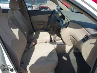 2008 Kia Rio LX with VIN KNADE123286297729, listed as a IAAI auction lot 42007714 with 51,268 mi miles. Bid and sale history available at carsss.com. Image 5.