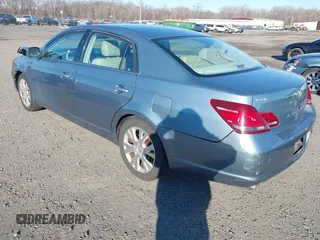 2008 Toyota Avalon XL with VIN 4T1BK36B28U256086, listed as a IAAI auction lot 41639696 with 107,537 mi miles. Bid and sale history available at carsss.com. Image 3.