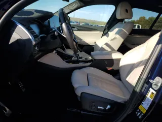2022 BMW X4 M40i with VIN 5UX43DT02N9K31818, listed as a Copart auction lot 38495943 with 12,673 mi miles. Bid and sale history available at carsss.com. Image 7.