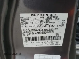 2011 Mercury Mariner Premier z VIN 4M2CN8HG8BKJ07653, wystawiony jako Copart lot #57495725 z przebiegiem 105 624 mil mil oraz Szkoda całkowita • Salvage title. Historia ofert i sprzedaży dostępna na DreamBid. Obrazek 13.