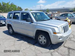 2010 Jeep Patriot Sport with VIN 1J4NT2GBXAD660180, listed as a IAAI auction lot 42146950 with 217,054 mi miles. Bid and sale history available at carsss.com. Image 1.