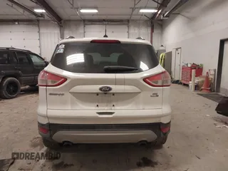 2016 Ford Escape SE with VIN 1FMCU9GX9GUC69153, listed as a IAAI auction lot 41504167 with 149,115 mi miles and . Bid and sale history available at DreamBid. Image 16.