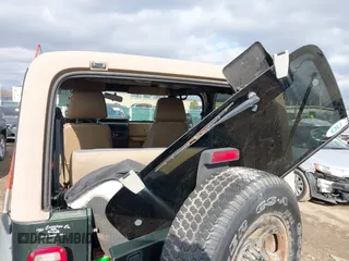 1997 Jeep Wrangler SE with VIN 1J4FY29PXVP406939, listed as a IAAI auction lot 41612380 with 248,314 mi miles. Bid and sale history available at carsss.com. Image 20.