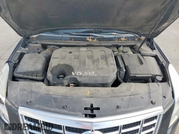 2013 Cadillac XTS Luxury with VIN 2G61P5S34D9244625, listed as a Copart auction lot 57832495 with 125,955 mi miles and Salvage title. Bid and sale history available at DreamBid. Image 11.