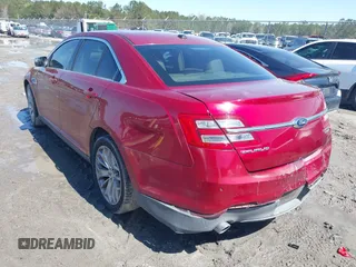 2013 Ford Taurus Limited with VIN 1FAHP2F80DG199576, listed as a IAAI auction lot 41759527 with 134,788 mi miles. Bid and sale history available at carsss.com. Image 3.