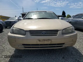 1999 Toyota Camry LE с VIN JT2BG22K6X0369818, выставлен на аукционе Copart как лот 54369385 с пробегом 246 320 миль миль и Списание • Salvage title. История ставок и продаж доступна на DreamBid. Изображение 5.