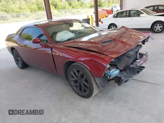 2019 Dodge Challenger SXT z VIN 2C3CDZAG4KH587596, wystawiony jako IAAI lot #42406478 z przebiegiem 102 099 mil mil oraz . Historia ofert i sprzedaży dostępna na DreamBid. Obrazek 1.