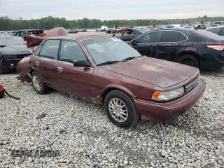 1989 Toyota Camry DLX z VIN 4T1SV21E1KU108151, wystawiony jako Copart lot #73657634 z przebiegiem 347 186 mil mil oraz Nie do naprawy • Non repairable. Historia ofert i sprzedaży dostępna na DreamBid. Obrazek 4.