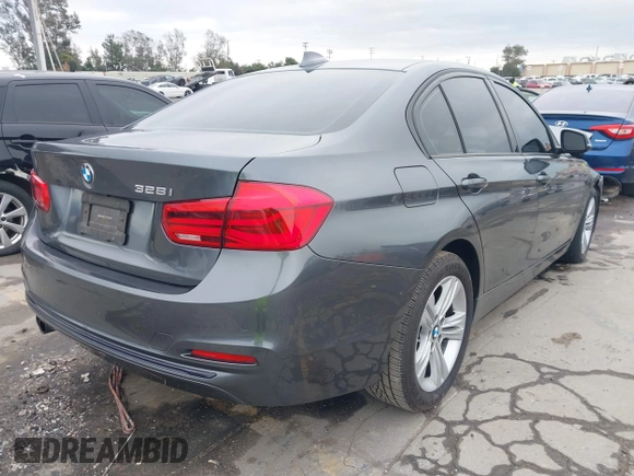 2016 BMW 3 Series 328i z VIN WBA8E9G53GNT85817, wystawiony jako IAAI lot #41765637 z przebiegiem 130 719 mil mil oraz . Historia ofert i sprzedaży dostępna na DreamBid. Obrazek 4.