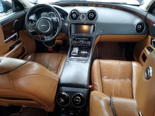 2014 Jaguar XJ Portfolio with VIN SAJWJ2GD5E8V69982, listed as a Copart auction lot 58933515 with 92,847 mi miles and Salvage title. Bid and sale history available at DreamBid. Image 8.