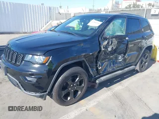 2018 Jeep Grand Cherokee Laredo E with VIN 1C4RJFAG4JC367924, listed as a IAAI auction lot 42065114 with 65,250 mi miles. Bid and sale history available at carsss.com. Image 2.
