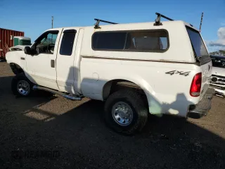 2003 Ford Super Duty F-250 XL with VIN 1FTNX21L83EB37779, listed as a Copart auction lot 77220014 with 160,011 mi miles and Salvage Title. Bid and sale history available at carsss.com. Image 2.