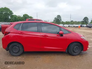 2017 Honda Fit LX z VIN 3HGGK5H58HM705063, wystawiony jako IAAI lot #41962906 z przebiegiem 163 835 mil mil oraz . Historia ofert i sprzedaży dostępna na DreamBid. Obrazek 13.