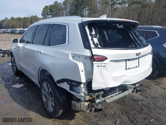 2020 Cadillac XT6 FWD Premium Luxury with VIN 1GYKPCRS5LZ130926, listed as a IAAI auction lot 41380898 with 69,244 mi miles. Bid and sale history available at carsss.com. Image 3.