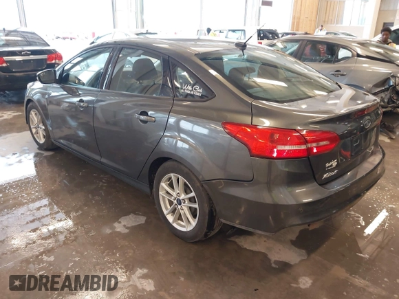 2016 Ford Focus SE with VIN 1FADP3F20GL234077, listed as a IAAI auction lot 41933546 with 106,184 mi miles and . Bid and sale history available at DreamBid. Image 3.