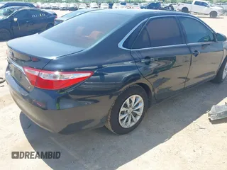 2016 Toyota Camry XLE with VIN 4T4BF1FK3GR535768, listed as a IAAI auction lot 41988698 with 157,452 mi miles. Bid and sale history available at carsss.com. Image 4.