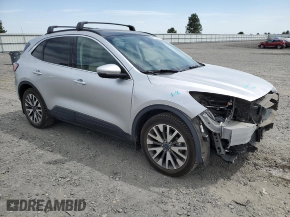 2020 Ford Escape Titanium with VIN 1FMCU9J99LUB07009, listed as a Copart auction lot 63213495 with 61,376 mi miles and Salvage title. Bid and sale history available at DreamBid. Image 4.