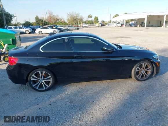 2015 BMW 2 Series 228i with VIN WBA1F5C58FV257021, listed as a IAAI auction lot 41318026 with 154,906 mi miles. Bid and sale history available at carsss.com. Image 13.