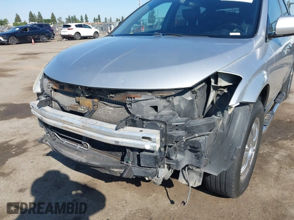 2003 Nissan Murano SE z VIN JN8AZ08T53W105311, wystawiony jako IAAI lot #42471608 z przebiegiem 155 806 mil mil oraz . Historia ofert i sprzedaży dostępna na DreamBid. Obrazek 6.