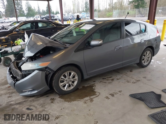 2010 Honda Insight EX with VIN JHMZE2H7XAS034098, listed as a IAAI auction lot 41939869 with 281,689 mi miles and . Bid and sale history available at DreamBid. Image 17.