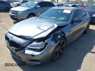 2013 BMW M6 with VIN WBSLX9C51DC968593, listed as a IAAI auction lot 42465979 with 88,010 mi miles and . Bid and sale history available at DreamBid. Image 20.