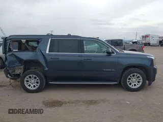 2019 GMC Yukon XL SLT with VIN 1GKS2GKC0KR345860, listed as a IAAI auction lot 40727072 with 127,568 mi miles and . Bid and sale history available at carsss.com. Image 14.