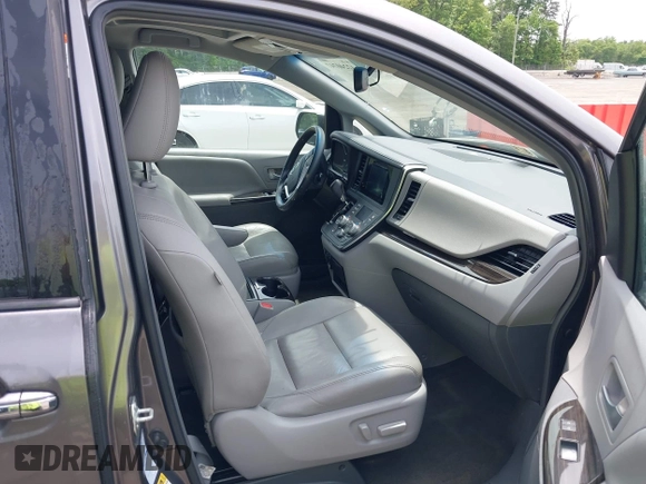 2015 Toyota Sienna Limited with VIN 5TDDK3DC6FS111675, listed as a IAAI auction lot 42240747 with 124,967 mi miles and . Bid and sale history available at DreamBid. Image 5.