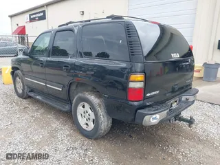 2004 Chevrolet Tahoe LT with VIN 1GNEC13Z04J262265, listed as a IAAI auction lot 42049698 with 376,367 mi miles. Bid and sale history available at carsss.com. Image 3.