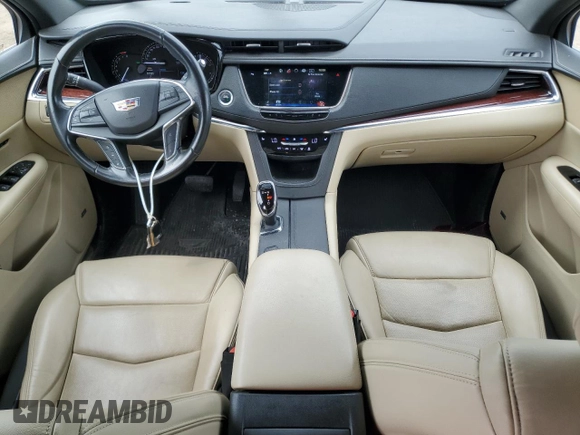 2019 Cadillac XT5 Luxury FWD with VIN 1GYKNCRSXKZ132871, listed as a Copart auction lot 54879405 with 57,325 mi miles and Salvage title. Bid and sale history available at DreamBid. Image 8.