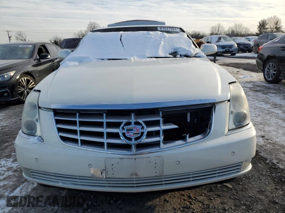 2007 Cadillac DTS Luxury I z VIN 1G6KD57Y57U223002, wystawiony jako Copart lot #87247984 z przebiegiem Nie podano mil oraz Szkoda całkowita • Salvage title. Historia ofert i sprzedaży dostępna na DreamBid. Obrazek 5.