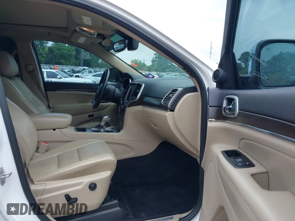 2018 Jeep Grand Cherokee Sterling with VIN 1C4RJEBG8JC289169, listed as a IAAI auction lot 42267113 with 77,274 mi miles and . Bid and sale history available at DreamBid. Image 5.