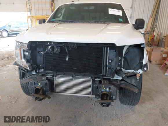 2018 Ford F-150 XL with VIN 1FTEW1EP9JFC77339, listed as a IAAI auction lot 42609496 with 78,601 mi miles and . Bid and sale history available at DreamBid. Image 6.