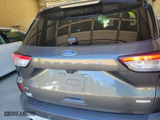 2020 Ford Escape SE with VIN 1FMCU0G60LUB83744, listed as a IAAI auction lot 42143155 with 84,968 mi miles. Bid and sale history available at carsss.com. Image 1.