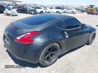 2013 Nissan 370Z z VIN JN1AZ4EH8DM880849, wystawiony jako IAAI lot #42131189 z przebiegiem Nie podano mil oraz . Historia ofert i sprzedaży dostępna na DreamBid. Obrazek 4.