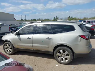 2014 Chevrolet Traverse LTZ z VIN 1GNKRJKDXEJ248849, wystawiony jako IAAI lot #41805119 z przebiegiem 171 489 mil mil oraz . Historia ofert i sprzedaży dostępna na DreamBid. Obrazek 15.