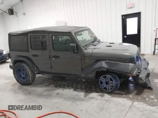 2020 Jeep Wrangler Unlimited Sport Altitude with VIN 1C4HJXDG7LW167909, listed as a IAAI auction lot 41413004 with 69,631 mi miles and . Bid and sale history available at DreamBid. Image 13.