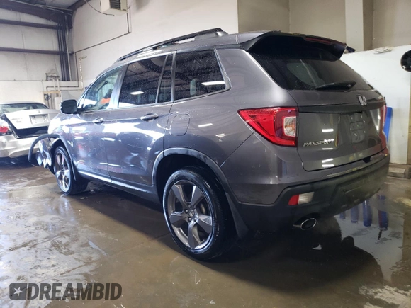 2021 Honda Passport Touring with VIN 5FNYF8H98MB012326, listed as a Copart auction lot 52165835 with 21,679 mi miles and Salvage Title. Bid and sale history available at carsss.com. Image 2.