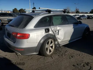 2014 Audi allroad Premium Plus with VIN WA1UFAFL0EA095646, listed as a Copart auction lot 47060685 with 118,557 mi miles and Salvage Title. Bid and sale history available at carsss.com. Image 3.