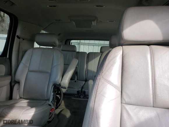 2009 Chevrolet Suburban LT w/2LT with VIN 1GNFC26J69J107100, listed as a Copart auction lot 42583415 with 265,445 mi miles and Salvage Title. Bid and sale history available at carsss.com. Image 10.