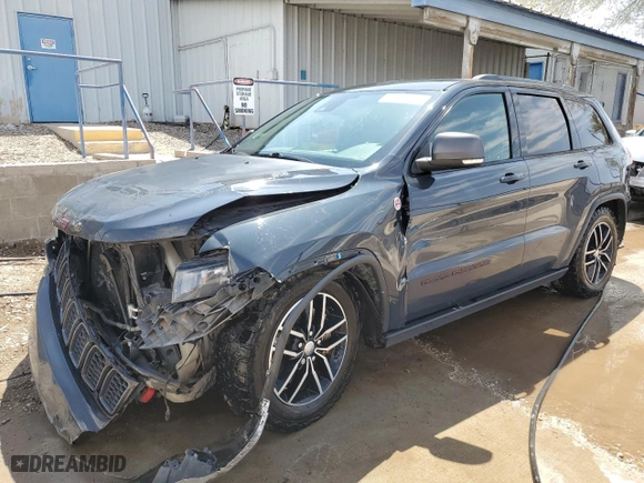 2018 Jeep Grand Cherokee Trailhawk with VIN 1C4RJFLT6JC328715, listed as a Copart auction lot 49987175 with 105,515 mi miles and Salvage Title. Bid and sale history available at carsss.com. Image 1.