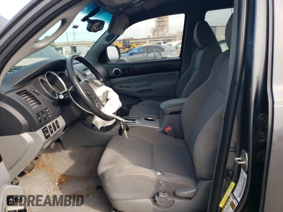 2010 Toyota Tacoma PreRunner with VIN 3TMJU4GN5AM097146, listed as a Copart auction lot 62339915 with 329,044 mi miles and Salvage title. Bid and sale history available at DreamBid. Image 7.