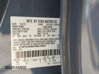2023 Ford Mustang Mach-E Premium z VIN 3FMTK3RM2PMA30800, wystawiony jako Copart lot #52613255 z przebiegiem 25 757 mil mil oraz Szkody całkowita. Historia ofert i sprzedaży dostępna na DreamBid. Obrazek 13.