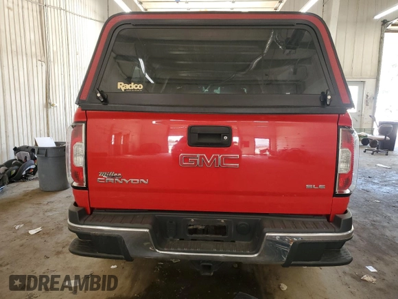 2016 GMC Canyon 2WD SLE with VIN 1GTH5CE33G1340174, listed as a Copart auction lot 62117235 with 110,909 mi miles and Salvage title. Bid and sale history available at DreamBid. Image 6.