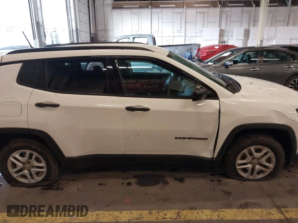 2018 Jeep Compass Sport with VIN 3C4NJCAB6JT124198, listed as a IAAI auction lot 41192196 with 104,557 mi miles. Bid and sale history available at carsss.com. Image 13.