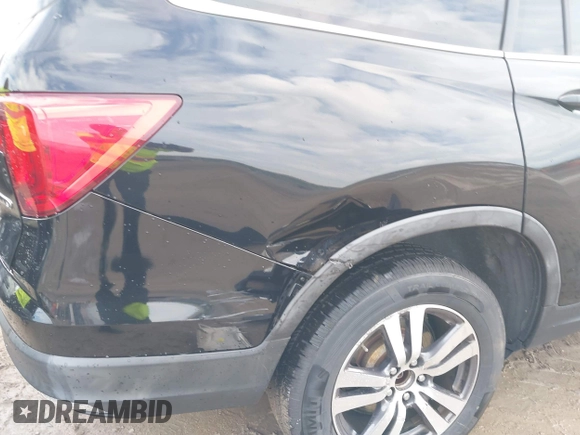 2016 Honda Pilot EX-L with VIN 5FNYF6H5XGB031594, listed as a IAAI auction lot 40409867 with 132,227 mi miles. Bid and sale history available at carsss.com. Image 6.