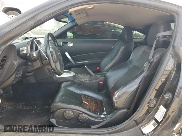 2007 Nissan 350Z with VIN JN1BZ34D97M504887, listed as a Copart auction lot 77140104 with 115,128 mi miles and Salvage Title. Bid and sale history available at DreamBid. Image 7.
