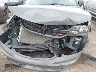 2020 Dodge Journey SE Value with VIN 3C4PDCAB0LT253914, listed as a IAAI auction lot 42064609 with 65,667 mi miles and . Bid and sale history available at carsss.com. Image 6.