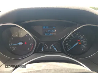 2012 Ford Focus SE z VIN 1FAHP3K2XCL270196, wystawiony jako Copart lot #57319575 z przebiegiem 80 364 mil mil oraz Szkoda całkowita • Salvage title. Historia ofert i sprzedaży dostępna na DreamBid. Obrazek 9.