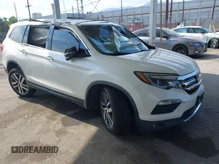 2017 Honda Pilot Touring with VIN 5FNYF5H93HB036506, listed as a IAAI auction lot 42771941 with 64,390 mi miles and . Bid and sale history available at DreamBid. Image 1.